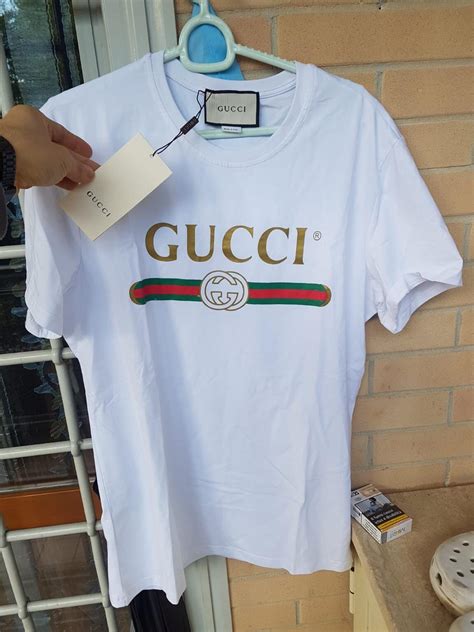 maglietta gucci bianca immagini|T.